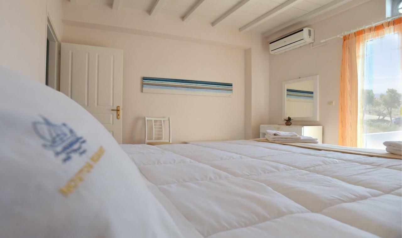 Nostos Beachfront Apartments & Studios Agios Ioannis  Bagian luar foto