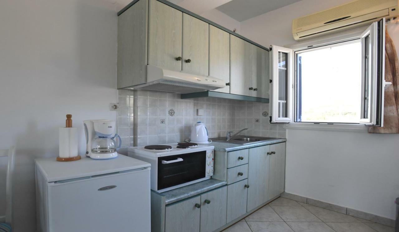 Nostos Beachfront Apartments & Studios Agios Ioannis  Bagian luar foto
