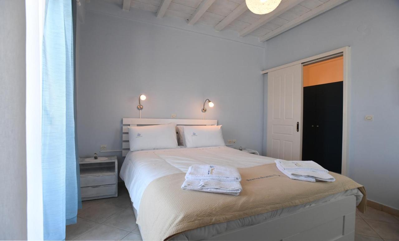 Nostos Beachfront Apartments & Studios Agios Ioannis  Bagian luar foto